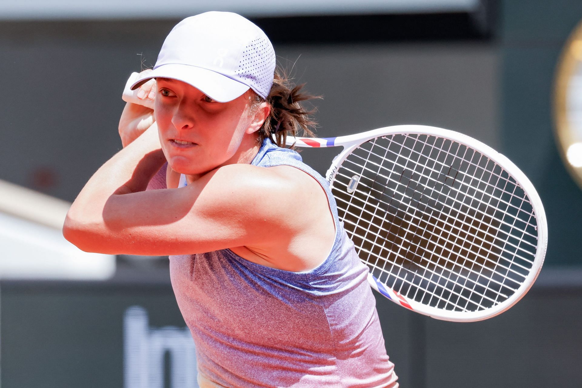 Iga Swiatek in action during her first-round match at the 2025 French Open (Source: Getty)